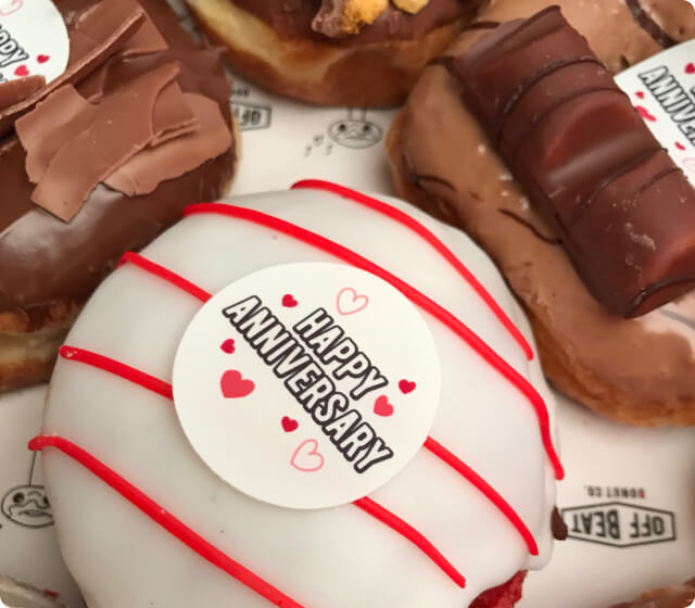 Happy Anniversary themed donuts