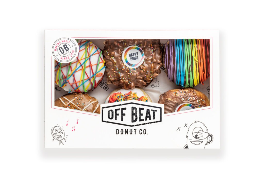 Six rainbow pride themed donuts