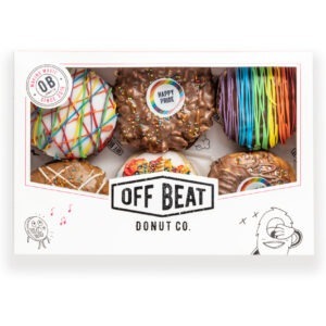 Six rainbow pride themed donuts