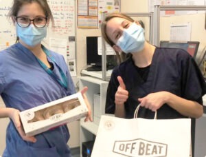 OffBeat in Hospital Healthcare workers holding boxes of Offbeat Donuts